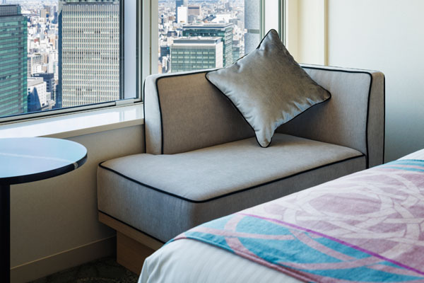 table and sofa at window side